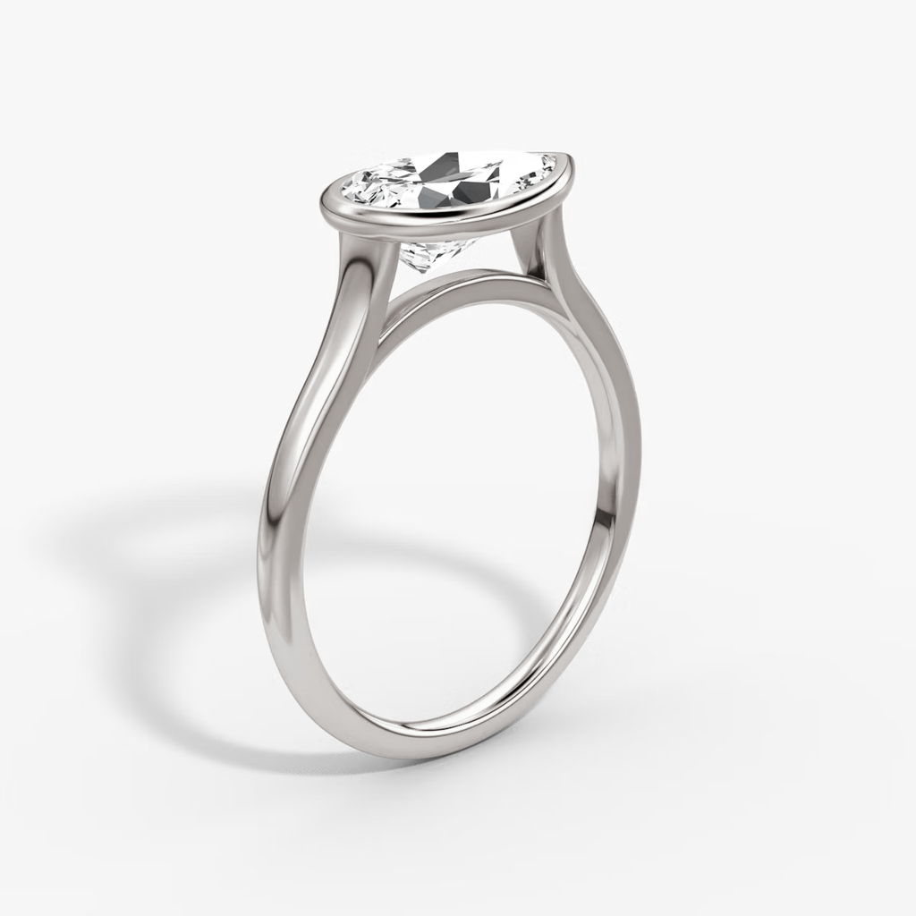 2.5 Carats Pear Shape Bezel Diamond Ring