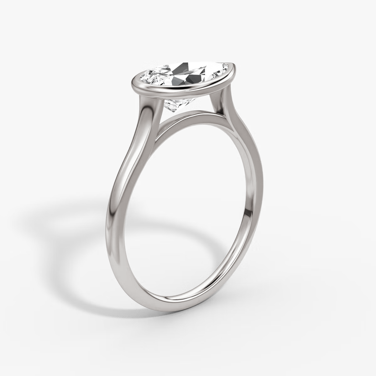 2.5 Carats Pear Shape Bezel Diamond Ring
